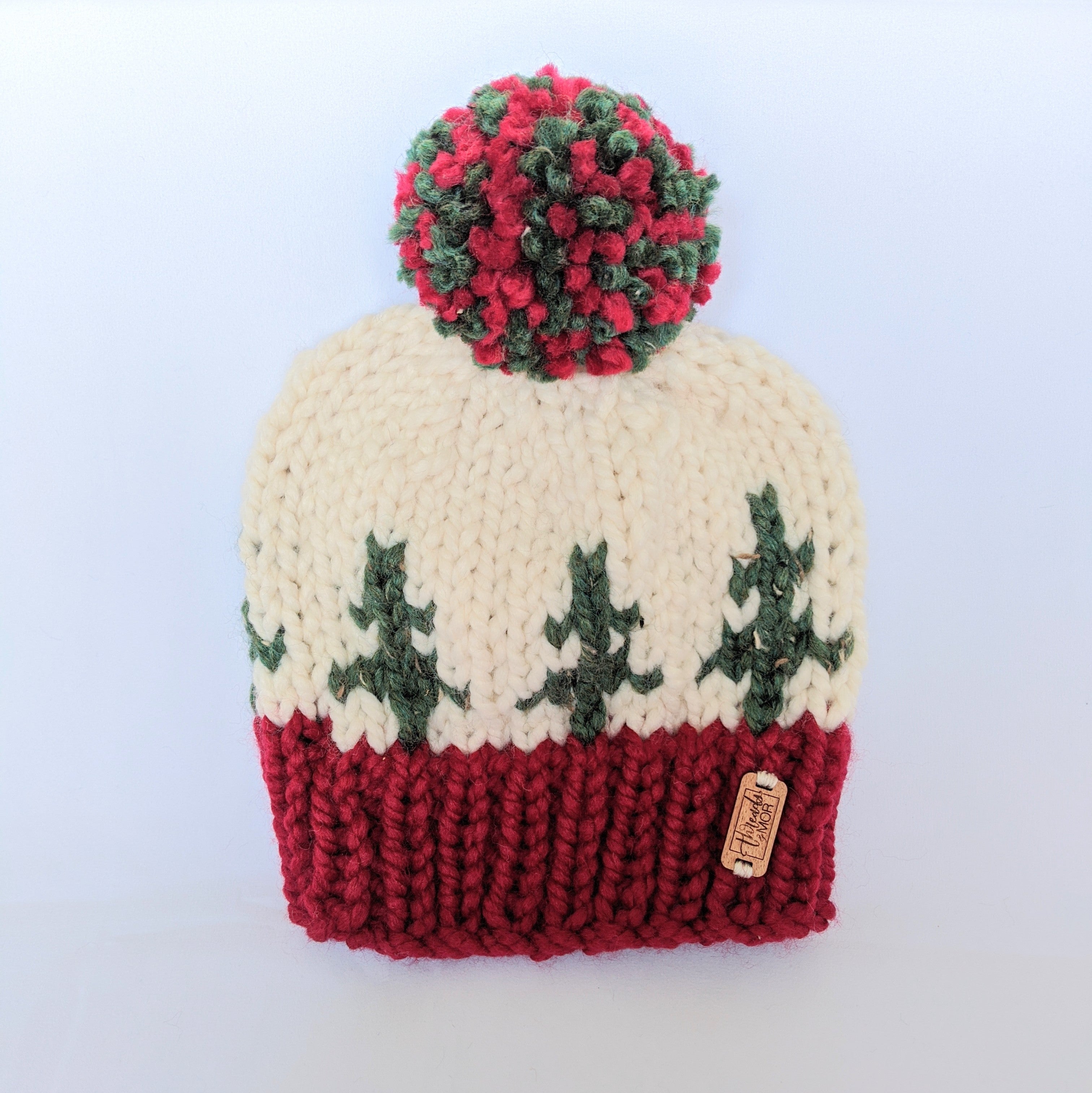 Holiday Spirit knit hat with yarn pompom