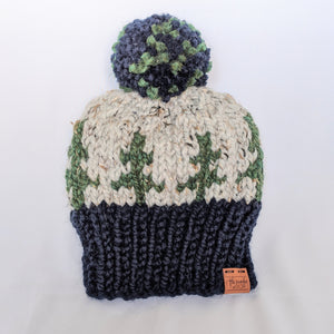Evergreen knit beanie hat with yarn pompom